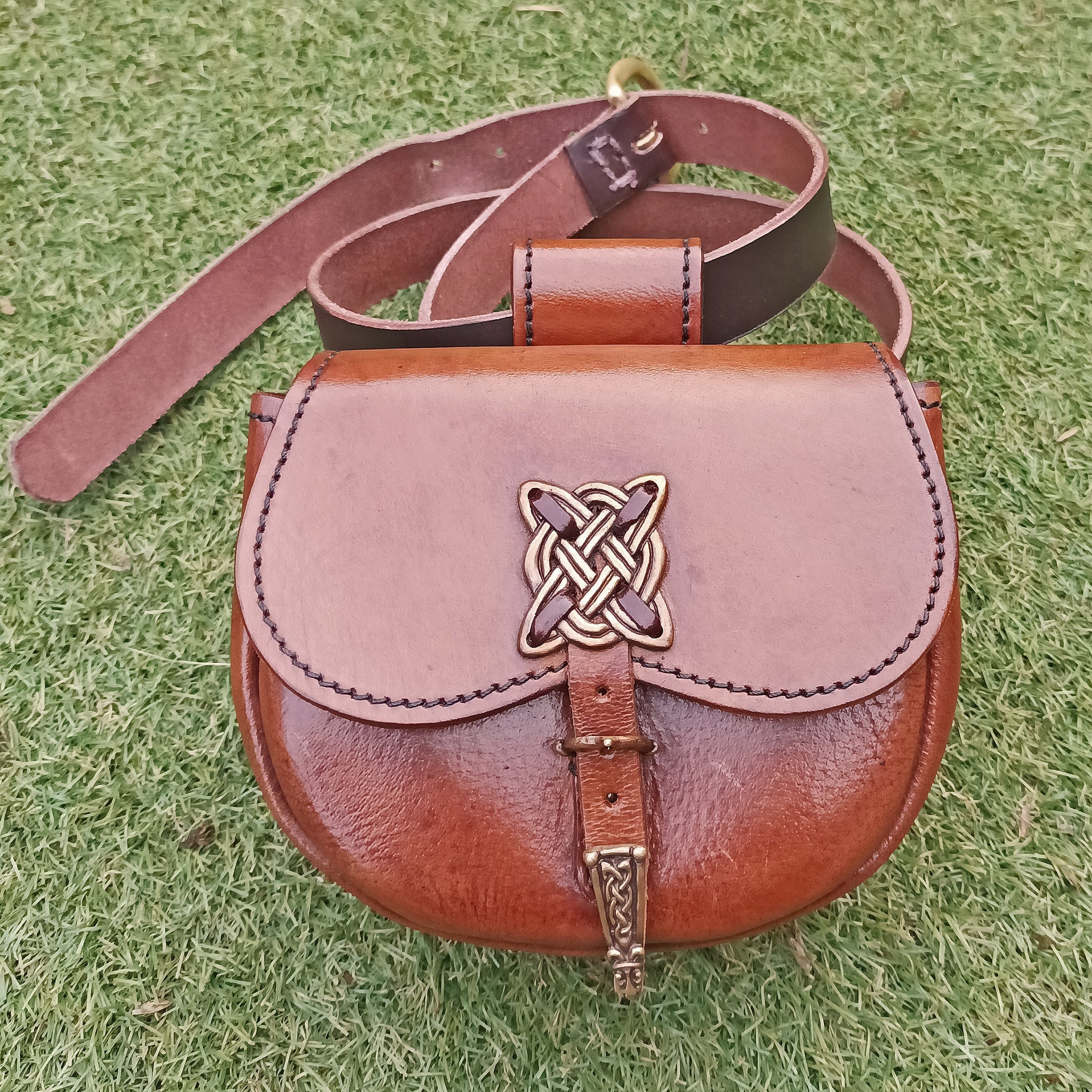 Turned Brown Leather Viking Belt Pouch with Bronze Fittings on Grass - Outside