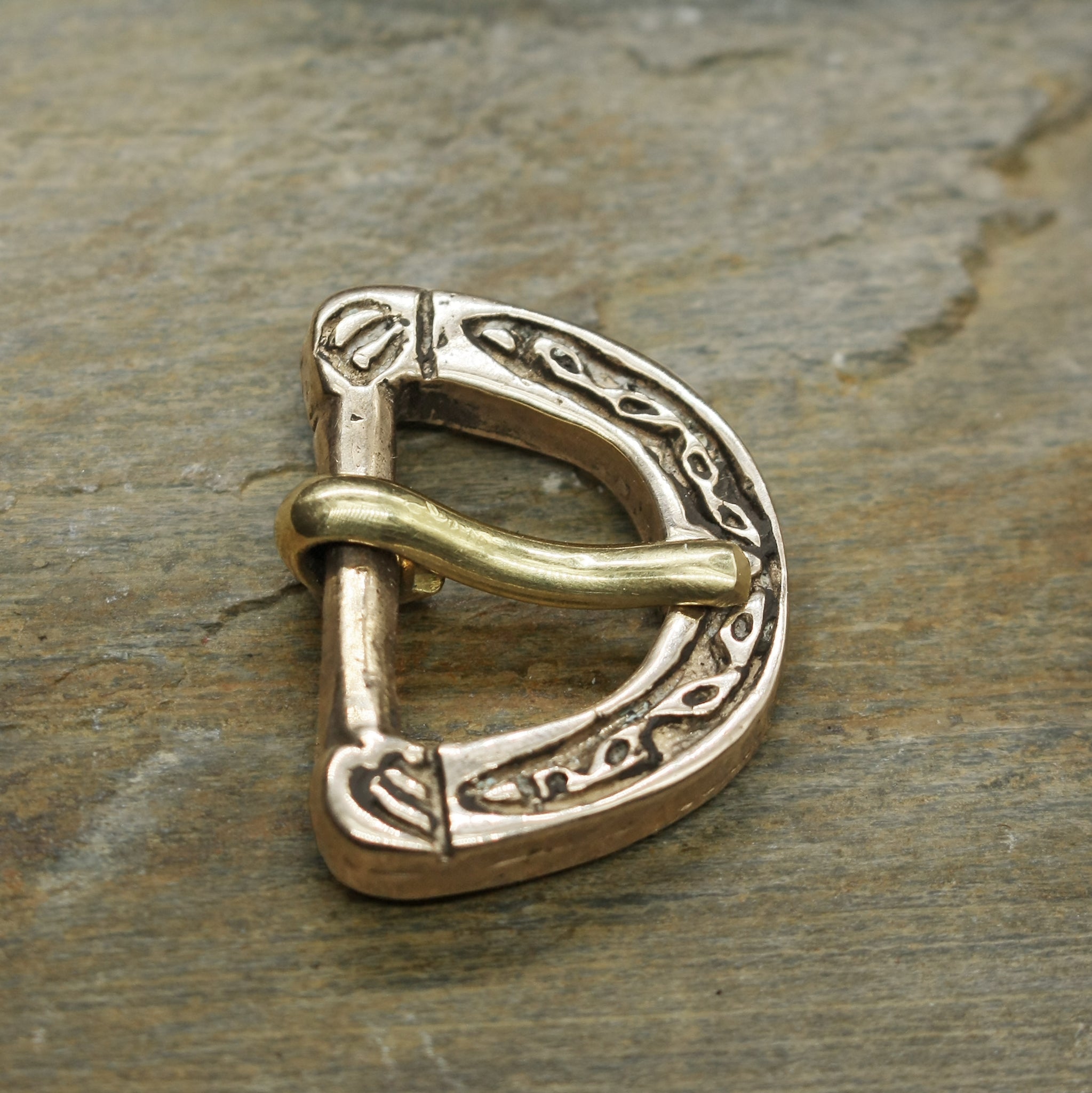 Replica Hiberno-Norse Vking Belt Buckle in Solid Bronze on Rock