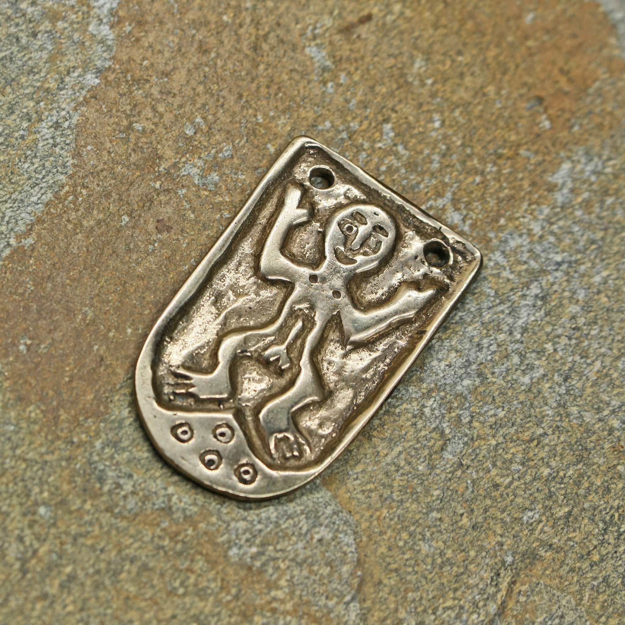 Large Hiberno Norse Bronze Strap End on Rock