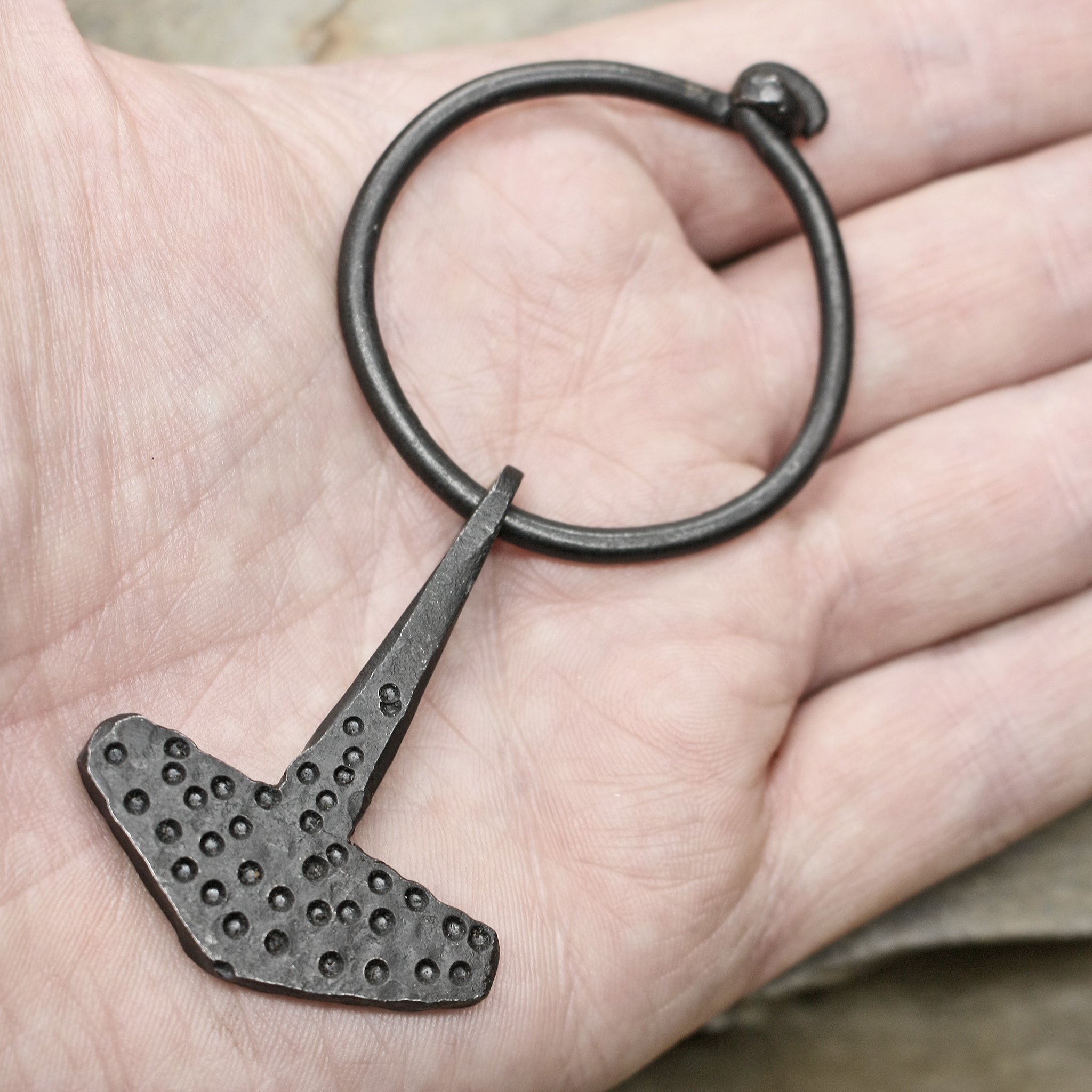 Embossed Iron Thors Hammer Replica Pendant on Ring on Hand