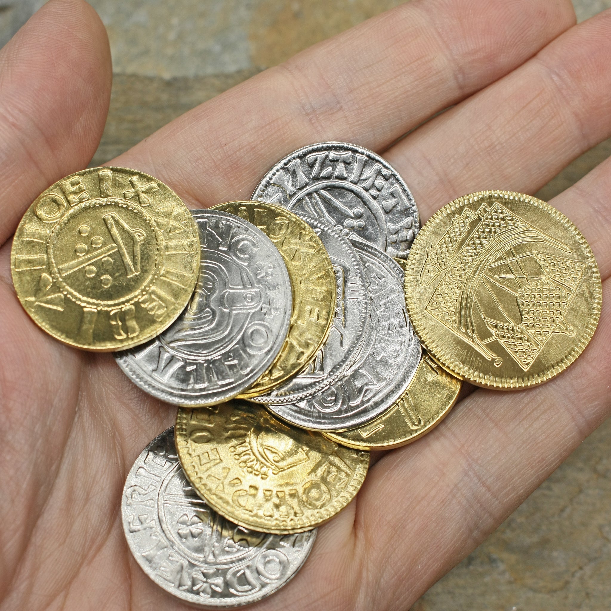 Large replica Viking coins x 10 in Hand