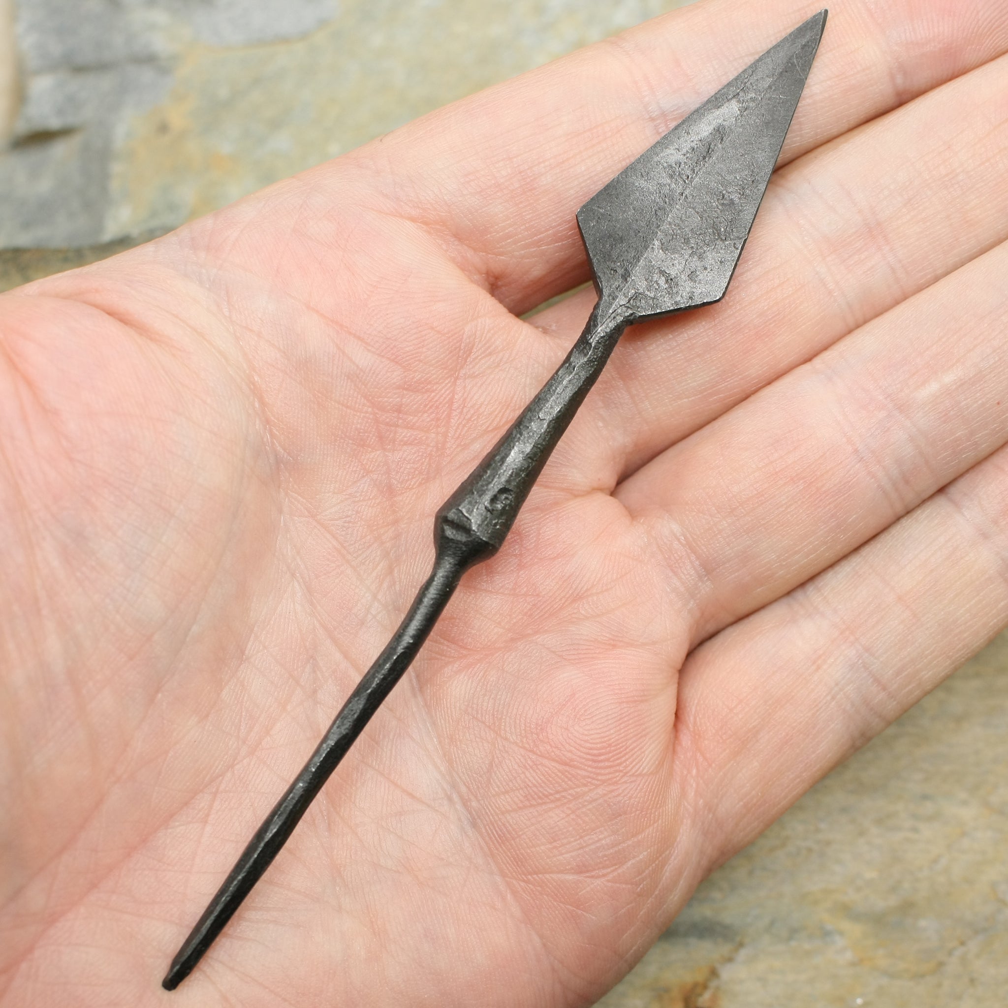 Hand-Forged Iron Arrowhead with Tang on Hand