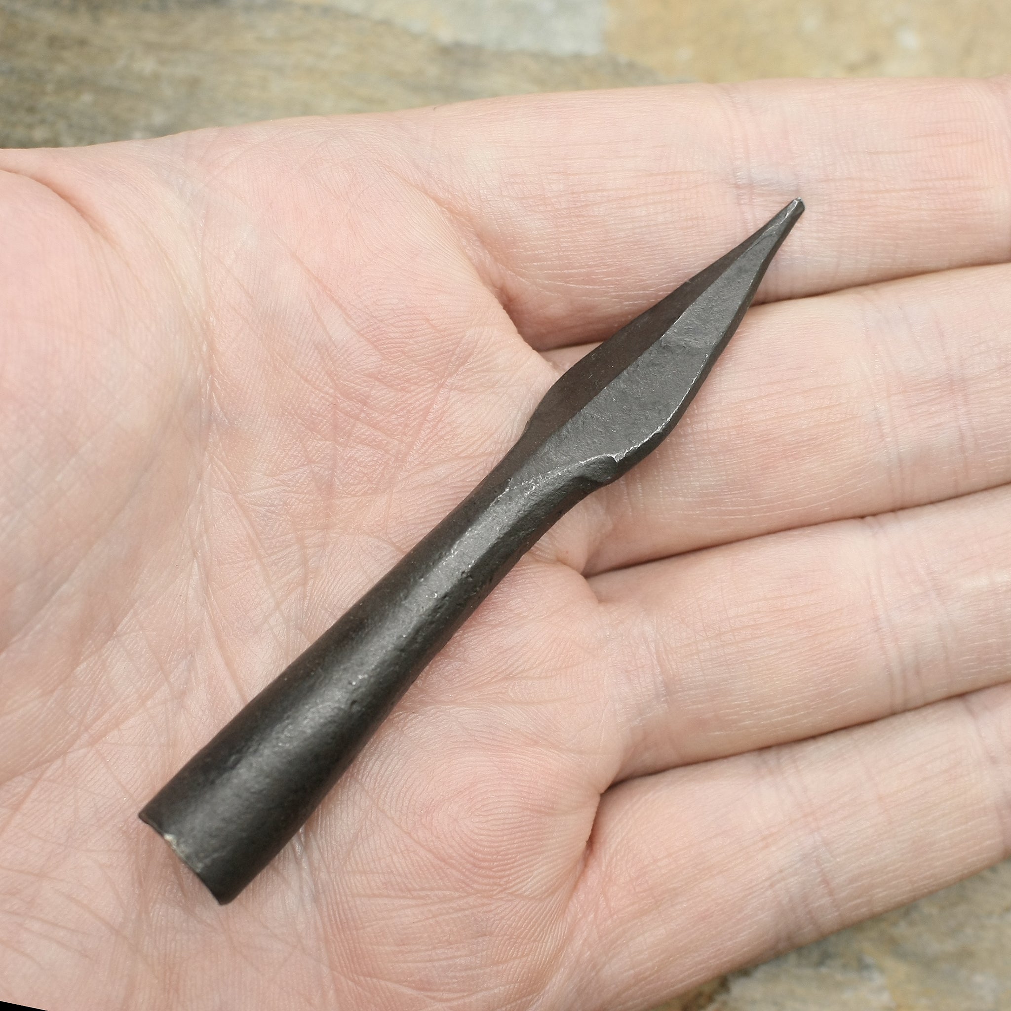 Hand-Forged Iron Arrowhead with Socket on Hand