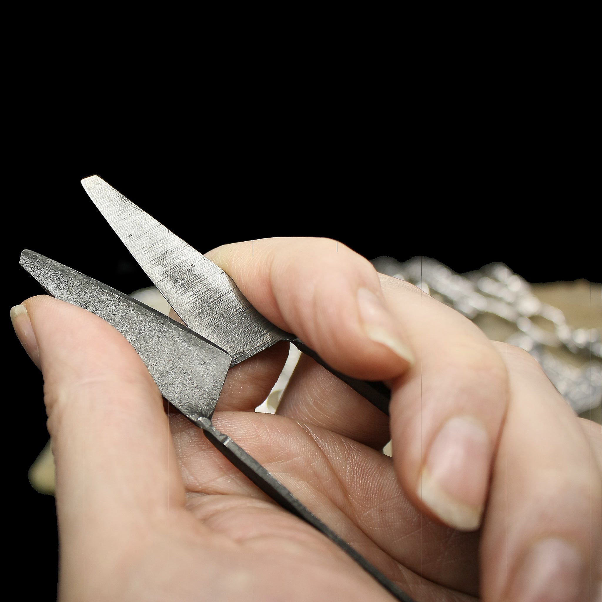 Small Iron Age Snips Holding