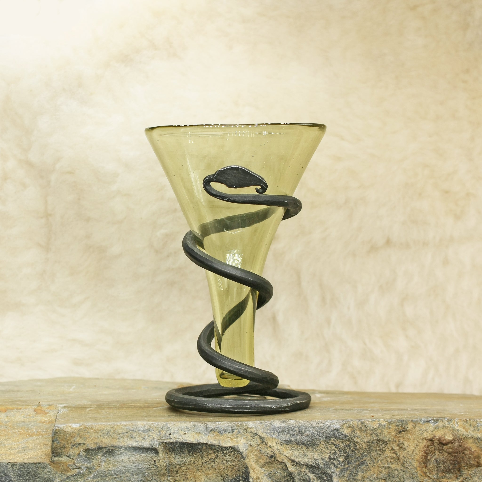 Plain Cone Mead Glass with Iron Snake Stand on Rock