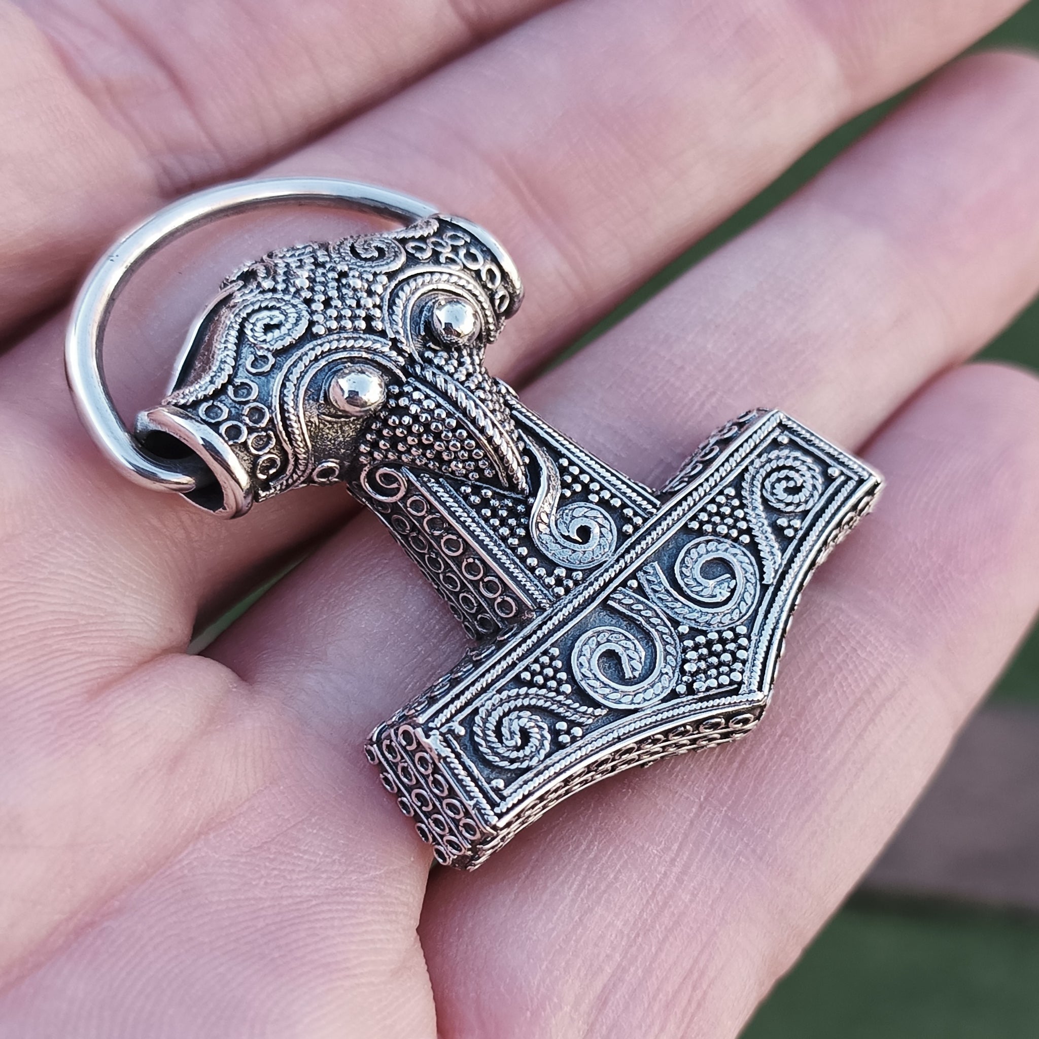 Silver Filigree Thors Hammer Pendant Replica from Kabara on Hand - Angle View