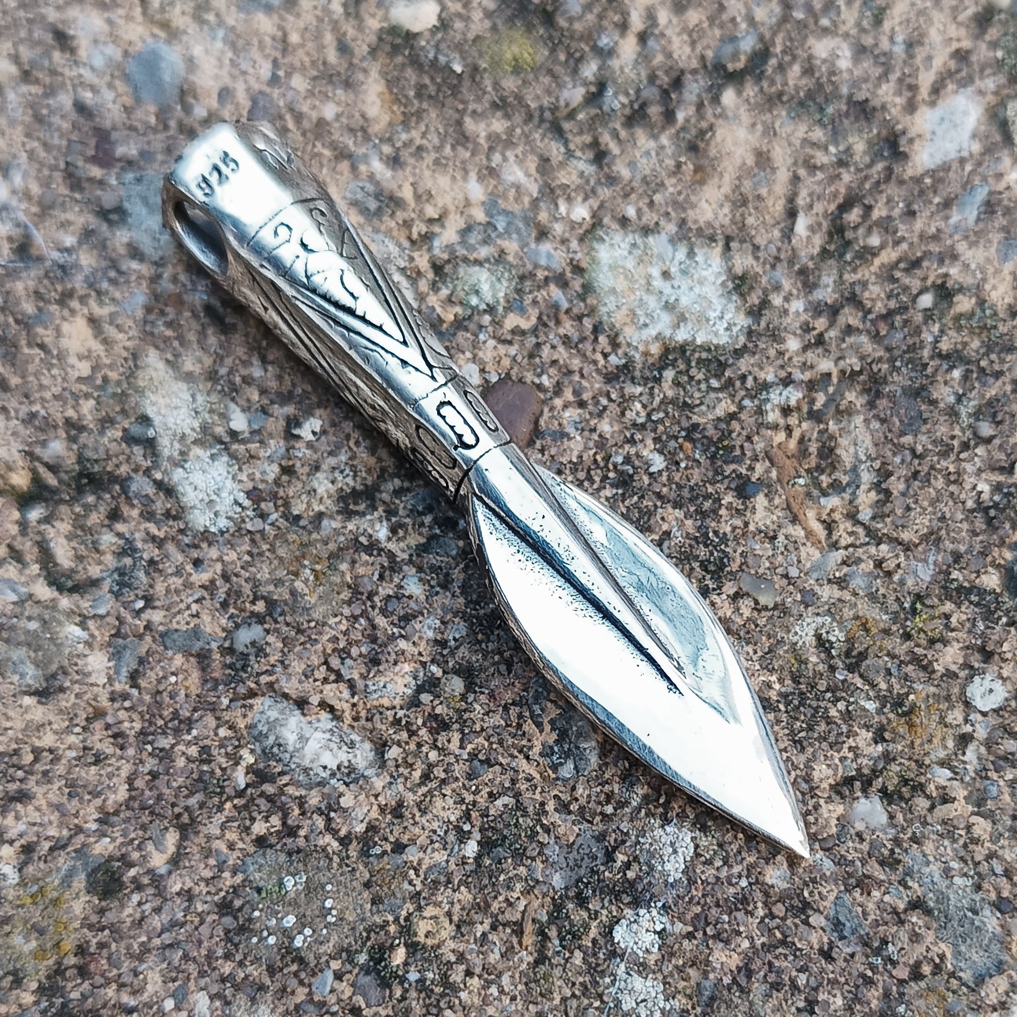 Silver Finnish Spear Head Pendant on Stone