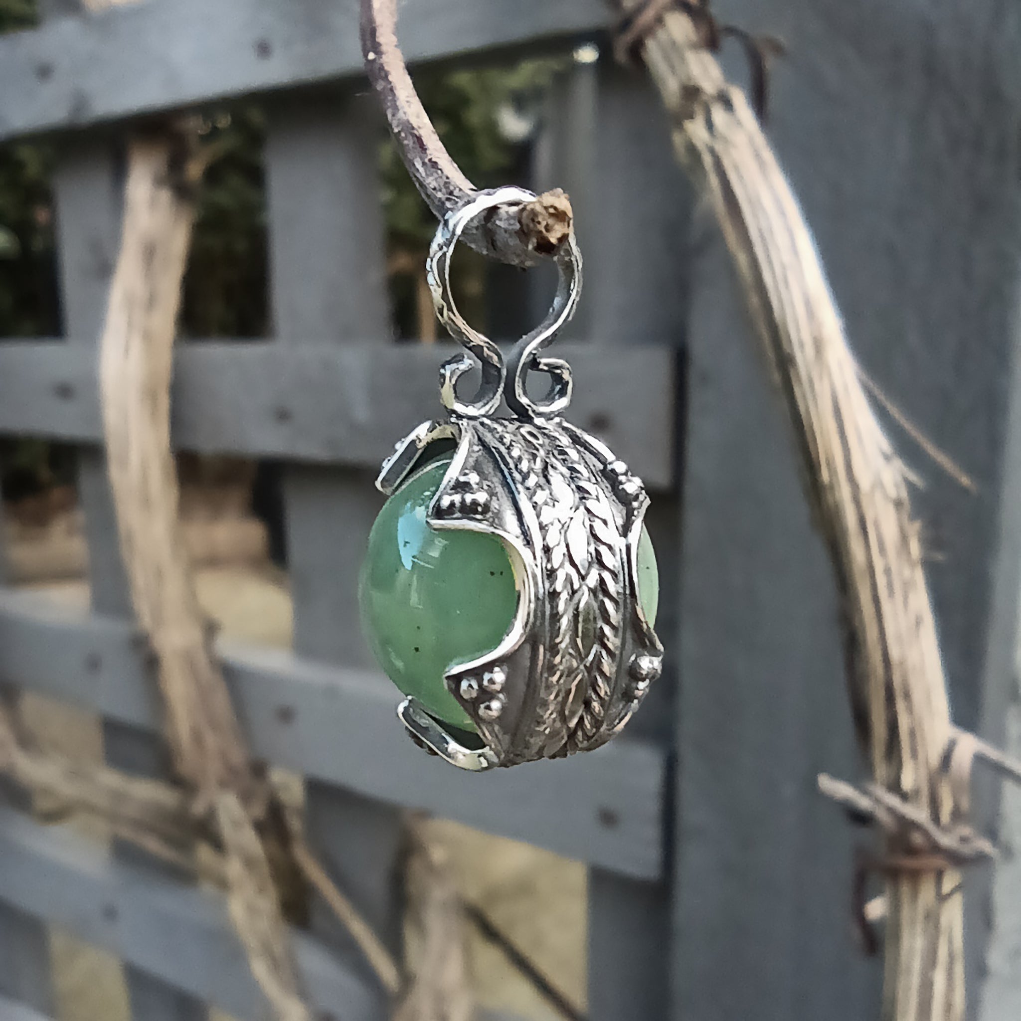 Small Silver Gotland Aventurine Ball Pendant - Hanging in Tree - Side View