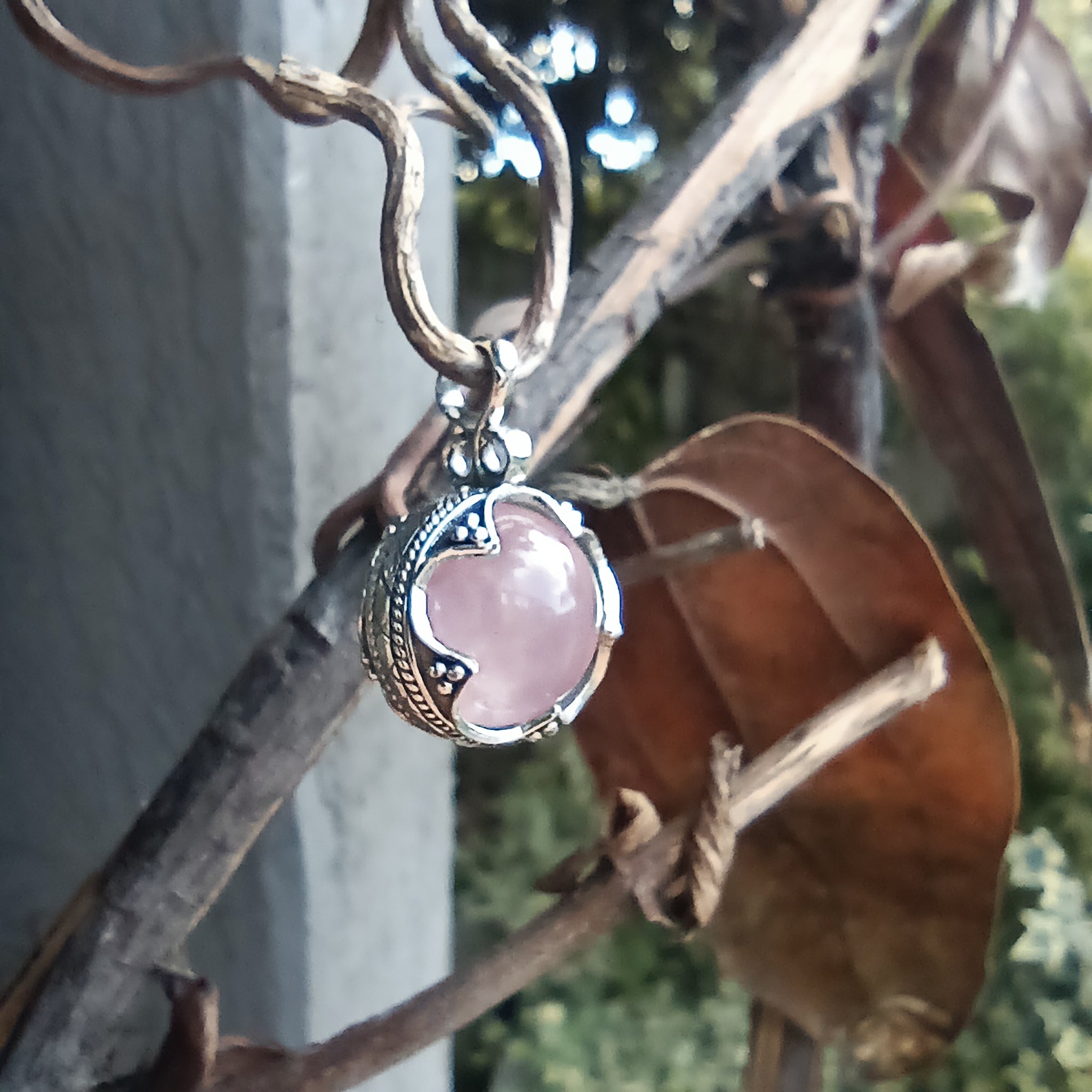 Small Silver Gotland Rose Quartz Ball Pendant - Hanging in Tree