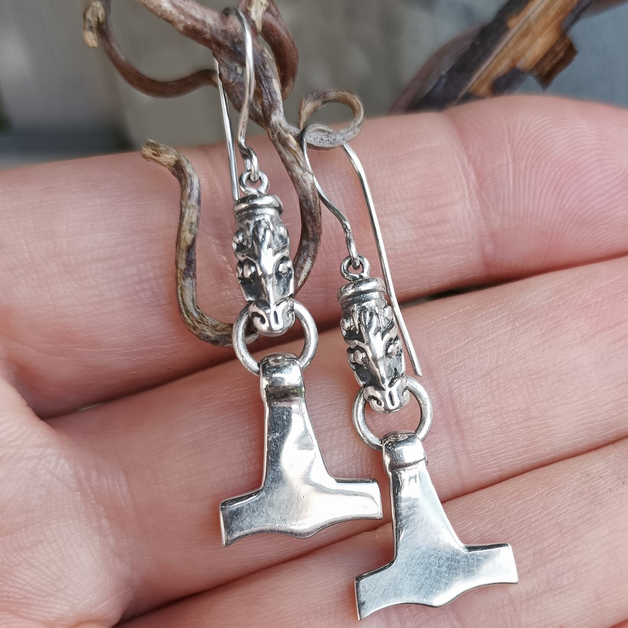 Silver Gotland Dragon Thors Hammer Earrings - Hanging in Hand