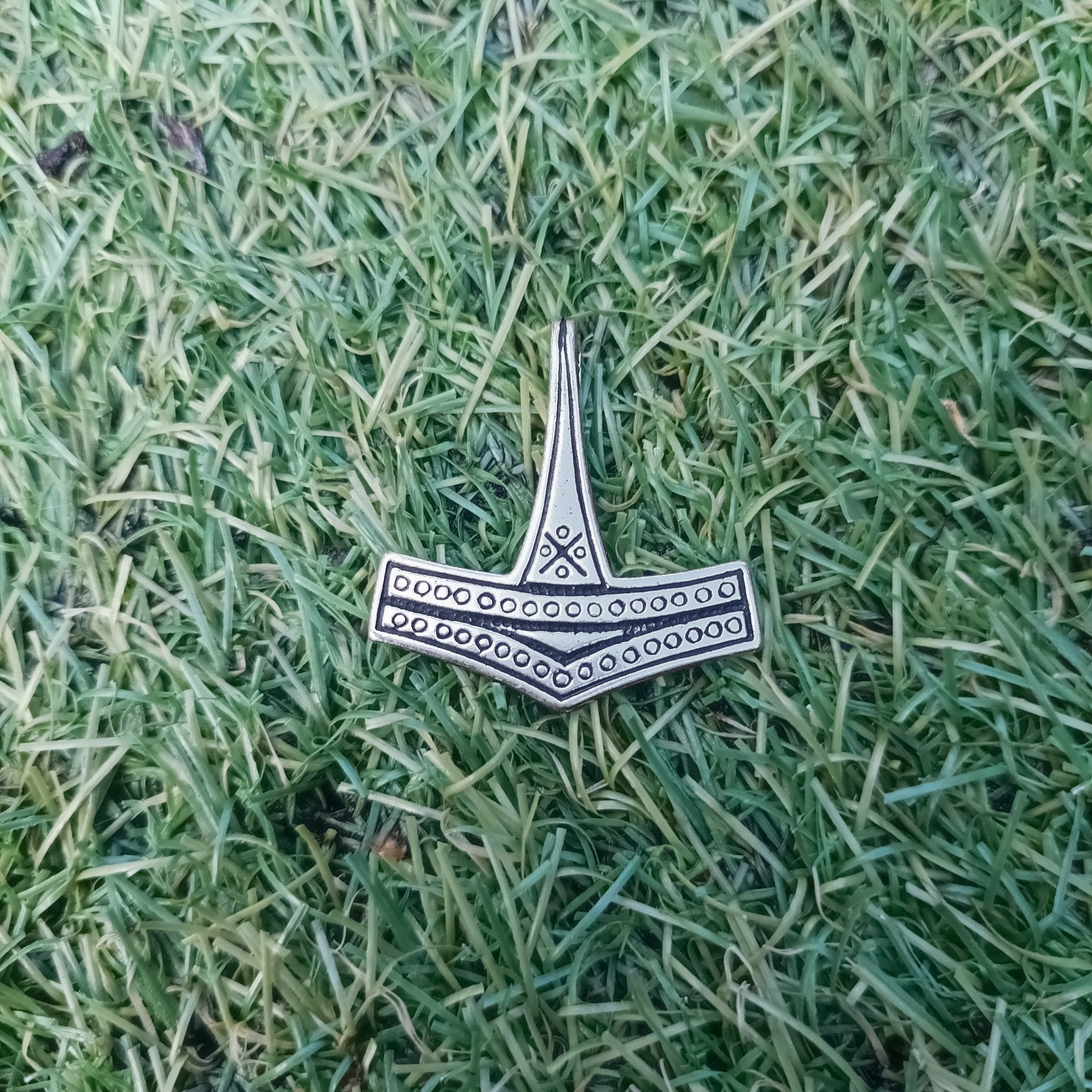 Silver Rømersdal Replica Thors Hammer Pendant on Grass