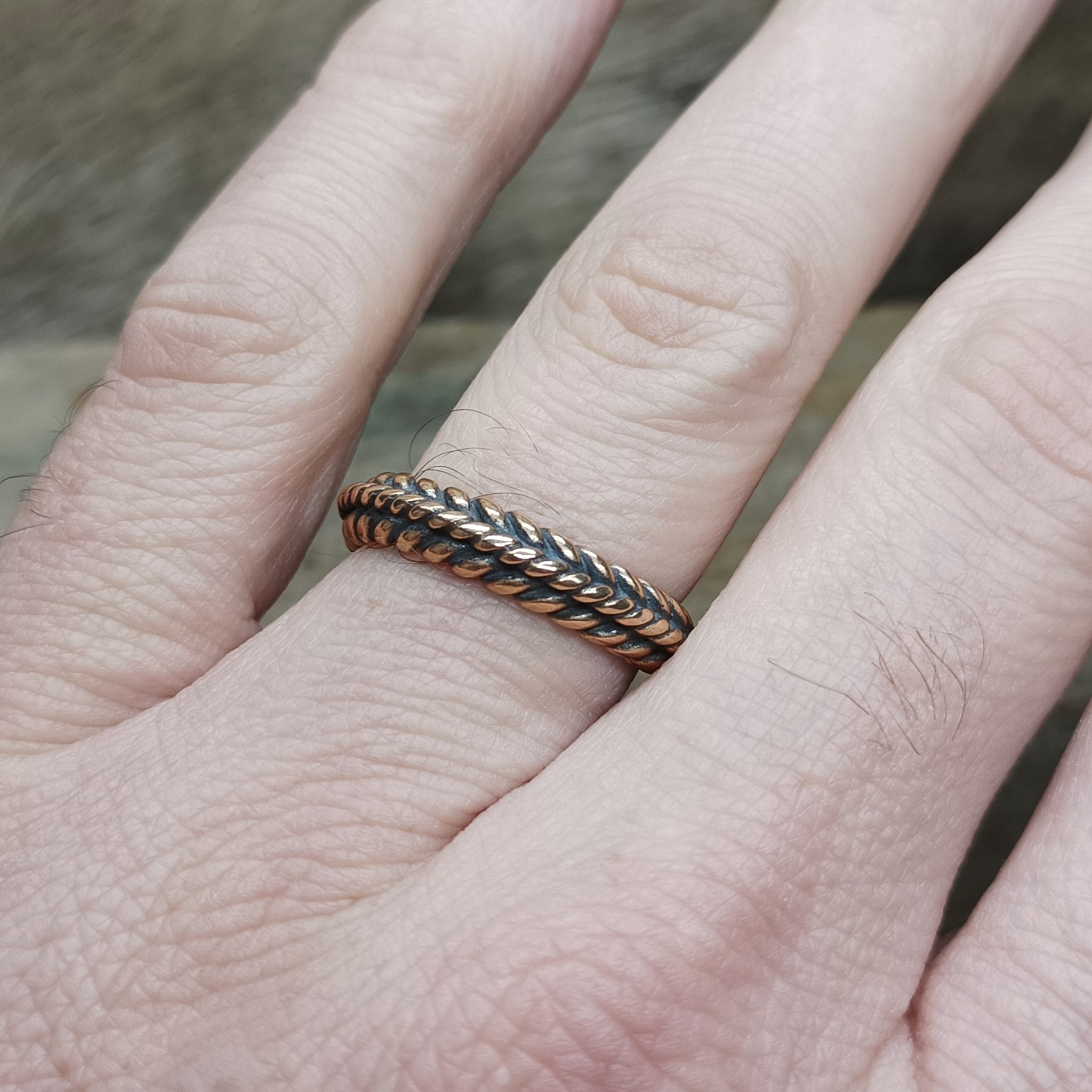 Bronze Braided Viking Ring on Finger - Front View